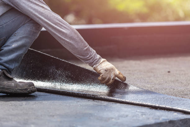Professional Basement Waterproofing technician working in Dunlap, OH